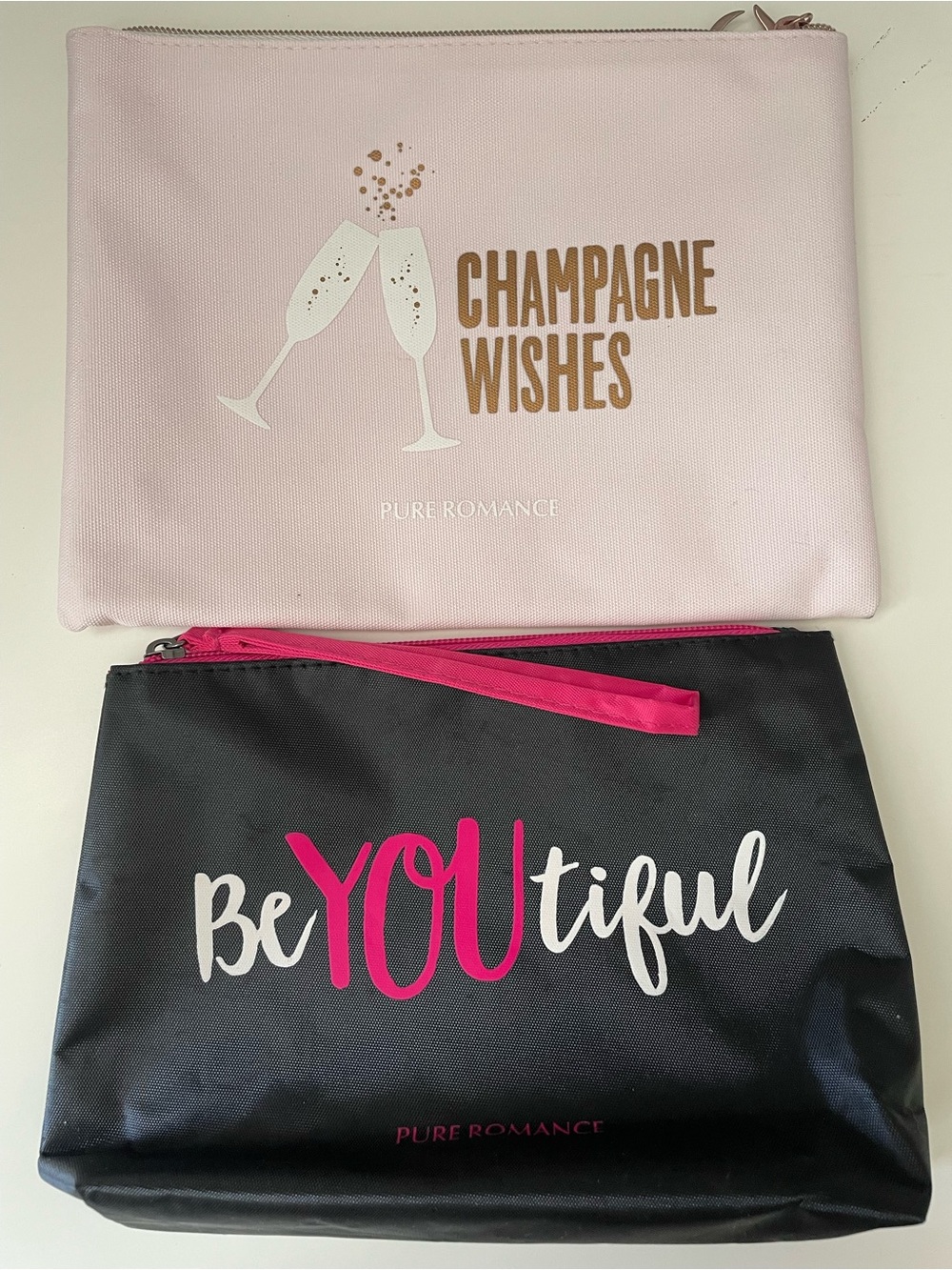 Pure Romance Champagne Wishes Pink Pouch & BeYOUtiful Black Cosmetic Bag Set